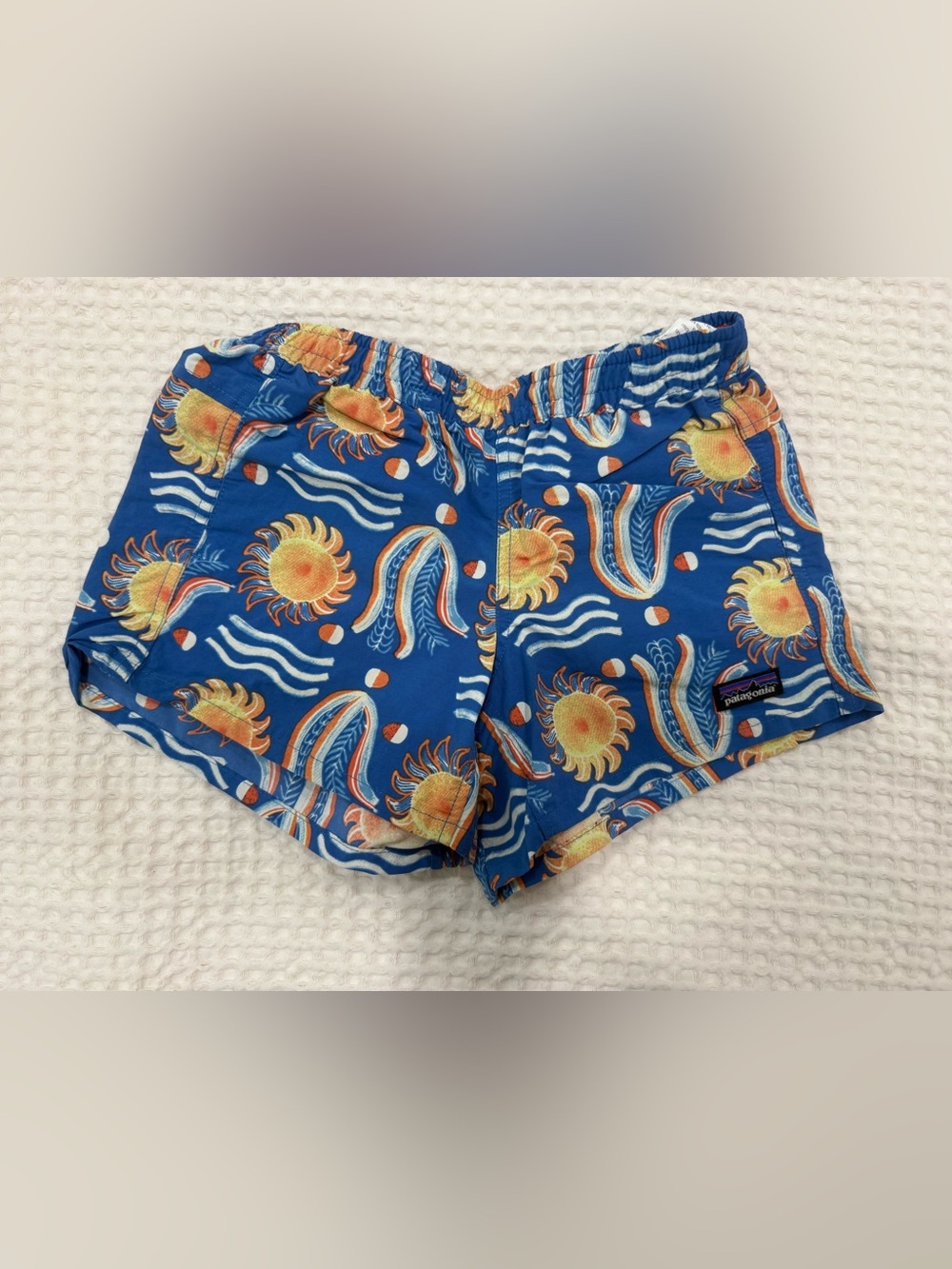 Patagonia Royal Blue “baggies” shorts  with Sun & Wave Print